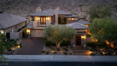 Cradled by the Red Rock Mountains, this exceptional estate on Red Rock Country Club in Nevada - for sale on GolfHomes.com, golf home, golf lot