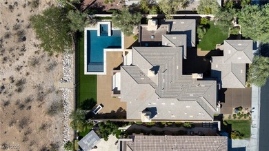 Cradled by the Red Rock Mountains, this exceptional estate on Red Rock Country Club in Nevada - for sale on GolfHomes.com, golf home, golf lot