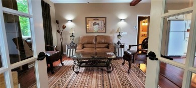 Welcome to a meticulously reimagined mountain estate, where no on The Highlands Course at Lake Arrowhead in Georgia - for sale on GolfHomes.com, golf home, golf lot
