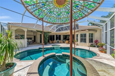 Experience the pinnacle of refined Florida living in this on University Park Country Club in Florida - for sale on GolfHomes.com, golf home, golf lot