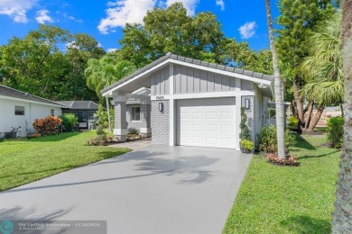 Fully Remodeled, Beautifully Updated Inside and Out  2 Bedroom / on Boca Greens Country Club in Florida - for sale on GolfHomes.com, golf home, golf lot