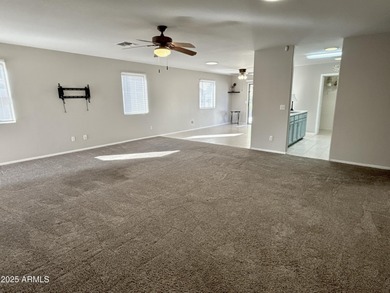 Single-story home on a premium corner lot with a pool in Johnson on The Golf Club At Johnson Ranch in Arizona - for sale on GolfHomes.com, golf home, golf lot