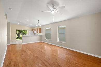 This meticulously maintained 3-bedroom, 2-bathroom, 2-car garage on Heritage Isles Golf and Country Club in Florida - for sale on GolfHomes.com, golf home, golf lot
