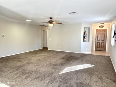 Single-story home on a premium corner lot with a pool in Johnson on The Golf Club At Johnson Ranch in Arizona - for sale on GolfHomes.com, golf home, golf lot