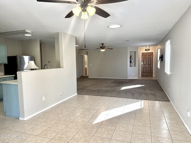 Single-story home on a premium corner lot with a pool in Johnson on The Golf Club At Johnson Ranch in Arizona - for sale on GolfHomes.com, golf home, golf lot