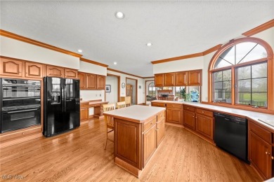 Nestled on the 5th hole of Barrington Golf Course, this brick on Barrington Golf Club in Ohio - for sale on GolfHomes.com, golf home, golf lot