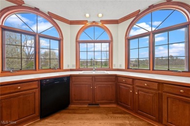 Nestled on the 5th hole of Barrington Golf Course, this brick on Barrington Golf Club in Ohio - for sale on GolfHomes.com, golf home, golf lot