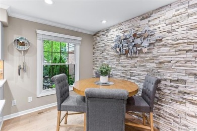 Nestled along a picturesque golf course and completely updated on Oak Pointe Country Club in Michigan - for sale on GolfHomes.com, golf home, golf lot