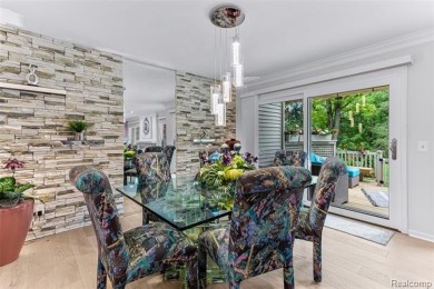 Nestled along a picturesque golf course and completely updated on Oak Pointe Country Club in Michigan - for sale on GolfHomes.com, golf home, golf lot