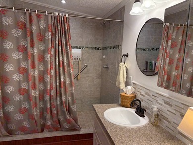 Beautifully maintained 2-bedroom, 2-bath home offering comfort on Lake Henry Golf Club in Florida - for sale on GolfHomes.com, golf home, golf lot