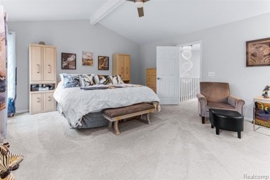 Nestled along a picturesque golf course and completely updated on Oak Pointe Country Club in Michigan - for sale on GolfHomes.com, golf home, golf lot