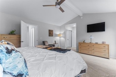 Nestled along a picturesque golf course and completely updated on Oak Pointe Country Club in Michigan - for sale on GolfHomes.com, golf home, golf lot