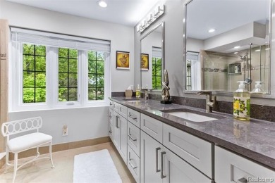 Nestled along a picturesque golf course and completely updated on Oak Pointe Country Club in Michigan - for sale on GolfHomes.com, golf home, golf lot