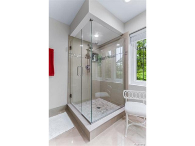 Nestled along a picturesque golf course and completely updated on Oak Pointe Country Club in Michigan - for sale on GolfHomes.com, golf home, golf lot