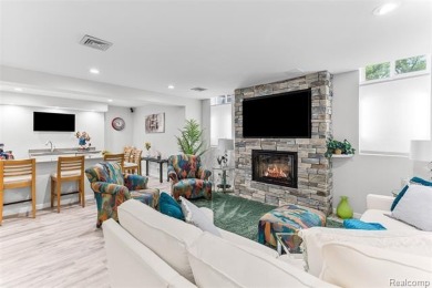 Nestled along a picturesque golf course and completely updated on Oak Pointe Country Club in Michigan - for sale on GolfHomes.com, golf home, golf lot