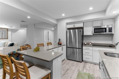 Nestled along a picturesque golf course and completely updated on Oak Pointe Country Club in Michigan - for sale on GolfHomes.com, golf home, golf lot