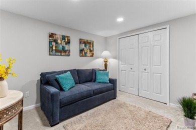 Nestled along a picturesque golf course and completely updated on Oak Pointe Country Club in Michigan - for sale on GolfHomes.com, golf home, golf lot