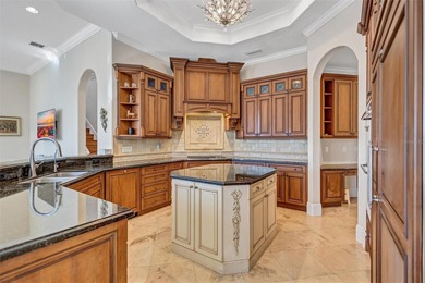 This stunning estate home was built with every detail in mind -- on The Founders Golf Club in Florida - for sale on GolfHomes.com, golf home, golf lot