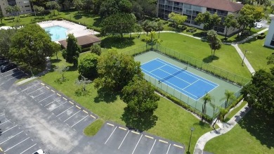 Welcome to this beautifully maintained 1 bed / 1 bath home on Flamingo Lakes Country Club in Florida - for sale on GolfHomes.com, golf home, golf lot