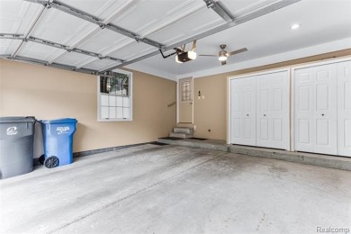 Nestled along a picturesque golf course and completely updated on Oak Pointe Country Club in Michigan - for sale on GolfHomes.com, golf home, golf lot