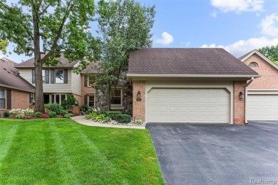 Nestled along a picturesque golf course and completely updated on Oak Pointe Country Club in Michigan - for sale on GolfHomes.com, golf home, golf lot