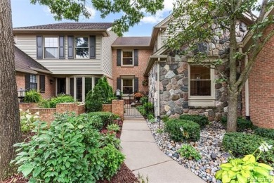 Nestled along a picturesque golf course and completely updated on Oak Pointe Country Club in Michigan - for sale on GolfHomes.com, golf home, golf lot