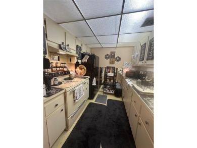 Welcome to this beautifully maintained 1 bed / 1 bath home on Flamingo Lakes Country Club in Florida - for sale on GolfHomes.com, golf home, golf lot