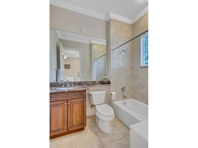 This stunning estate home was built with every detail in mind -- on The Founders Golf Club in Florida - for sale on GolfHomes.com, golf home, golf lot