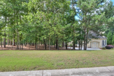 Lovely French country home on beautifully landscaped .47 acre on Woodside Plantation Country Club in South Carolina - for sale on GolfHomes.com, golf home, golf lot
