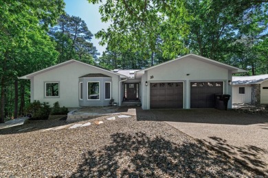 Enjoy breathtaking views & the perfect blend of relaxation & on Cortez Golf Course in Arkansas - for sale on GolfHomes.com, golf home, golf lot