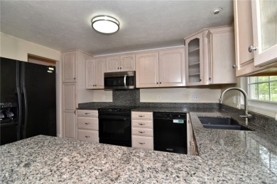 This charming bi-level home offers 3 bedrooms and 2 full baths on Gleneagles Golf Club in Ohio - for sale on GolfHomes.com, golf home, golf lot