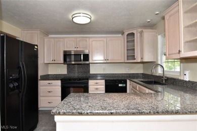 This charming bi-level home offers 3 bedrooms and 2 full baths on Gleneagles Golf Club in Ohio - for sale on GolfHomes.com, golf home, golf lot