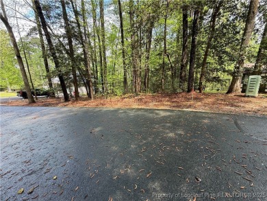 Beautiful lot ready for a new construction home. Sewer, water on Carolina Trace Country Club in North Carolina - for sale on GolfHomes.com, golf home, golf lot