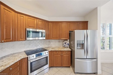Come see this beautiful first-floor carriage home on the golf on The Colony Golf and Country Club in Florida - for sale on GolfHomes.com, golf home, golf lot