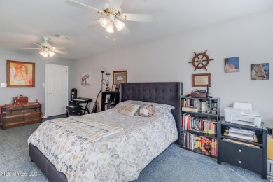 MOTIVATED SELLERS:  (** This house comes with an option for a on Diamondhead Country Club in Mississippi - for sale on GolfHomes.com, golf home, golf lot