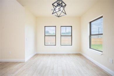 This fresh and functional 3-bedroom, 2-bath home offers style on The Club At Runaway Bay in Texas - for sale on GolfHomes.com, golf home, golf lot