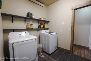 Adorable golf course home located in Stewart Country Club on Star Valley RV Golf Course in Wyoming - for sale on GolfHomes.com, golf home, golf lot