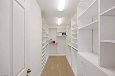 Come see this beautiful first-floor carriage home on the golf on The Colony Golf and Country Club in Florida - for sale on GolfHomes.com, golf home, golf lot