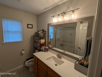 MOTIVATED SELLERS:  (** This house comes with an option for a on Diamondhead Country Club in Mississippi - for sale on GolfHomes.com, golf home, golf lot