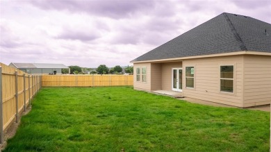 This fresh and functional 3-bedroom, 2-bath home offers style on The Club At Runaway Bay in Texas - for sale on GolfHomes.com, golf home, golf lot