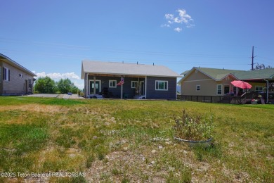 Adorable golf course home located in Stewart Country Club on Star Valley RV Golf Course in Wyoming - for sale on GolfHomes.com, golf home, golf lot
