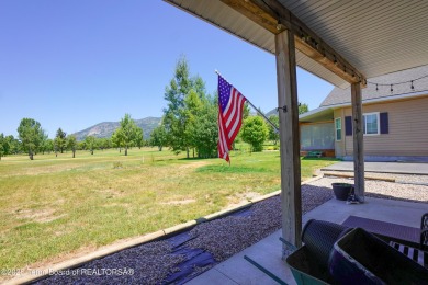Adorable golf course home located in Stewart Country Club on Star Valley RV Golf Course in Wyoming - for sale on GolfHomes.com, golf home, golf lot