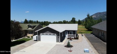 Adorable golf course home located in Stewart Country Club on Star Valley RV Golf Course in Wyoming - for sale on GolfHomes.com, golf home, golf lot