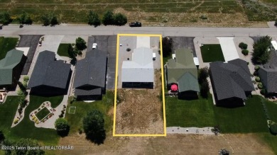 Adorable golf course home located in Stewart Country Club on Star Valley RV Golf Course in Wyoming - for sale on GolfHomes.com, golf home, golf lot
