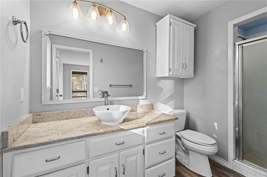 Nestled in Bella Vista, this one-of-a-kind retreat is surrounded on Bella Vista - Metfield Golf Complex and Country Club in Arkansas - for sale on GolfHomes.com, golf home, golf lot