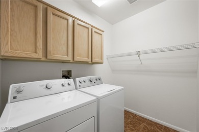 Crisp, clean, and move-in ready -- this charming Warwick model on Highland Falls Golf Club in Nevada - for sale on GolfHomes.com, golf home, golf lot