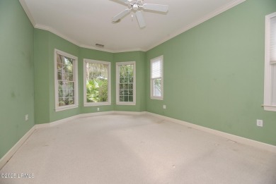 Nestled on a serene cul-de-sac within the lush, verdant on Dataw Island Club in South Carolina - for sale on GolfHomes.com, golf home, golf lot