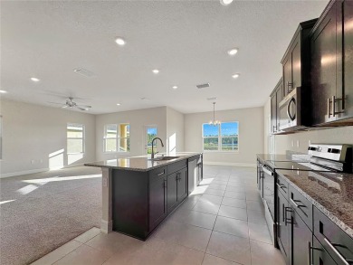 Brand New move-in ready Home 4 bedrooms and 2.5 bathrooms on Harmony Golf Preserve in Florida - for sale on GolfHomes.com, golf home, golf lot