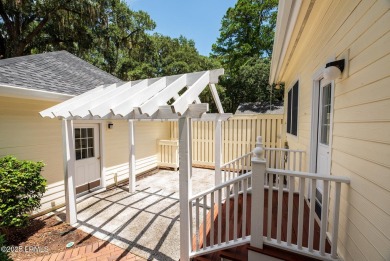 Nestled on a serene cul-de-sac within the lush, verdant on Dataw Island Club in South Carolina - for sale on GolfHomes.com, golf home, golf lot