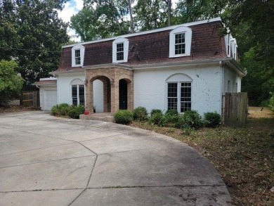 Beautiful spacious fixer upper in the heart of Buckhead.  This on Bobby Jones Golf Club in Georgia - for sale on GolfHomes.com, golf home, golf lot